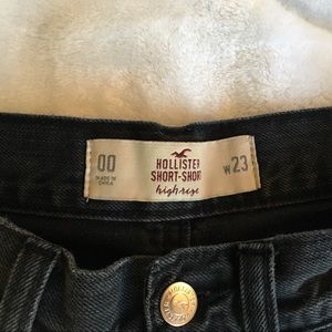 Blackish Greyish hollister distressed shorts